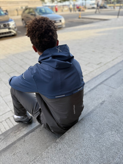 TRAIL - X Windbreaker Tidal Blue & Carbon Grey